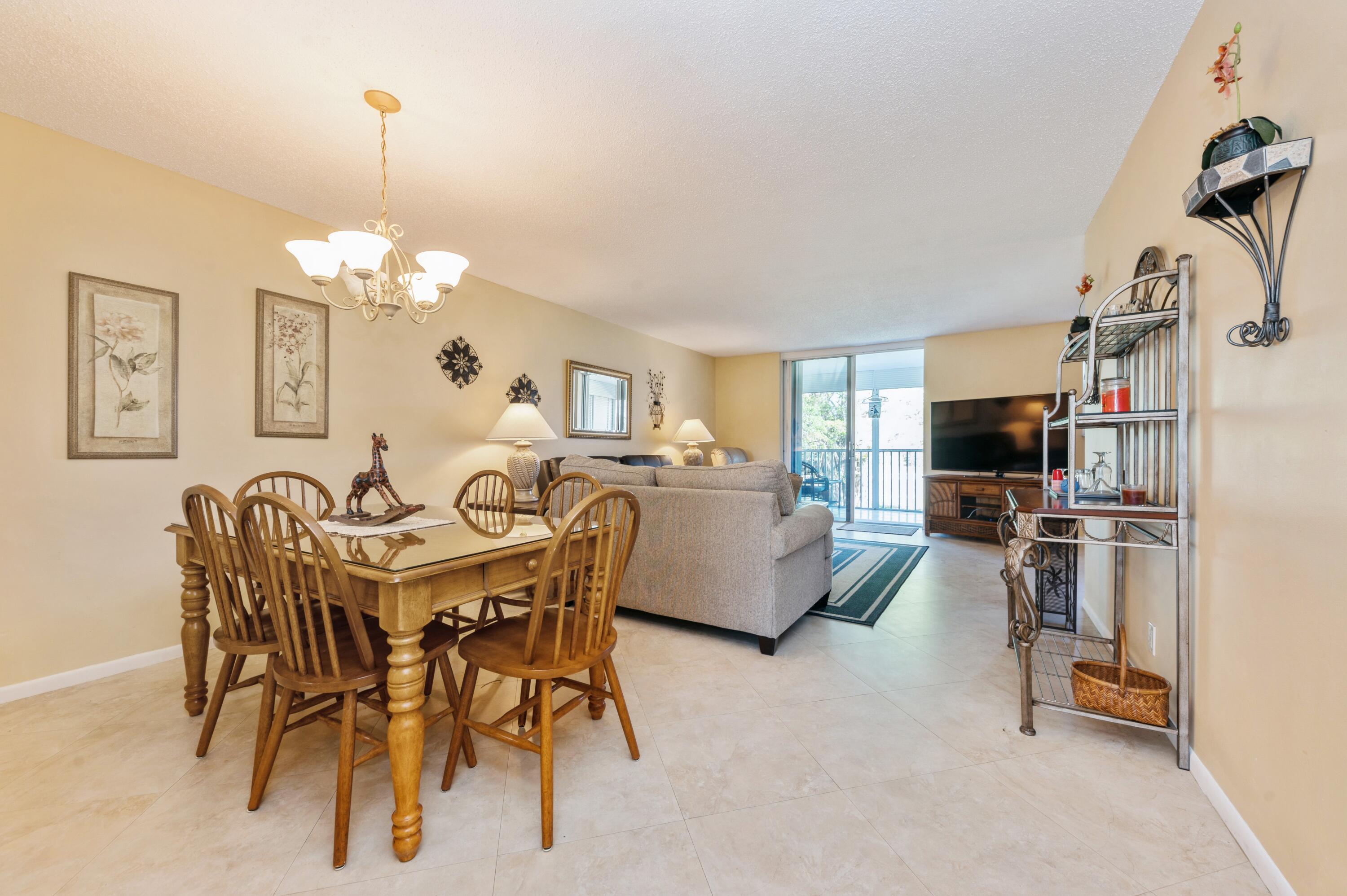 5500 Northwest 2nd Avenue, Unit 324 Boca Raton, FL 33487 - Photo 14 of 17 05_5500-NW-2nd-Ave_Apt-324_Living-Room-D