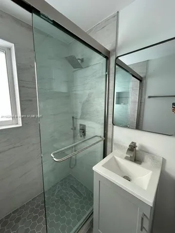 a house view with a backyard space