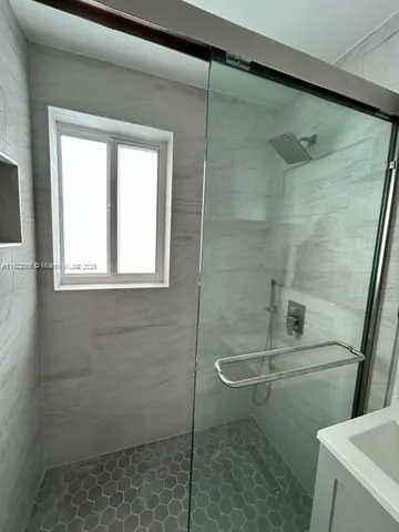 a house view with a backyard space