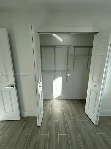 a view of a house with a street