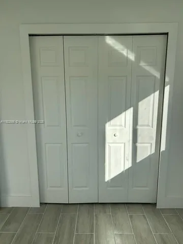 a view of storage and utility room