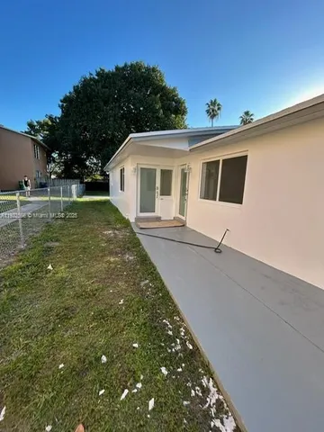 a view of swimming pool with outdoor space and seating area