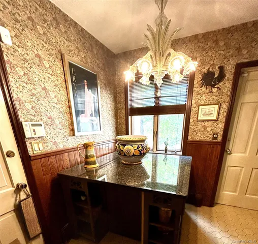 a kitchen with a stove and cabinets