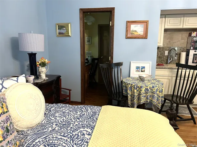 a bedroom with bed and a window