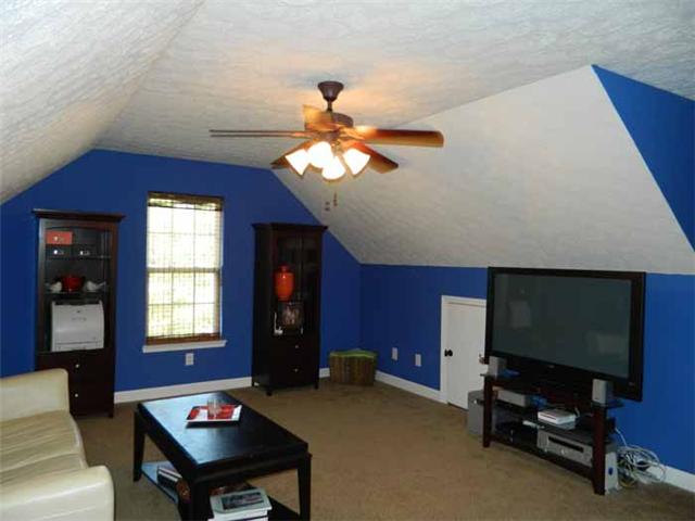 835 Ridgetop Drive Mount Juliet, TN 37122 - Photo 14 of 20 Recreational Room: 19 x 15 Located above the garage w/ vaulted ceiling, upgraded carpeting, design allows for a great media / game room, large walk-in storage closet and additional storage access behind the knee walls