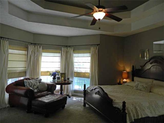 835 Ridgetop Drive Mount Juliet, TN 37122 - Photo 16 of 20 Master Suite: 17 x 14 Luxurious Master Suite with upgraded carpeting, raised double treyed ceiling, expanded bay window area to allow for a sitting area, access to the deck, tranquil color design,