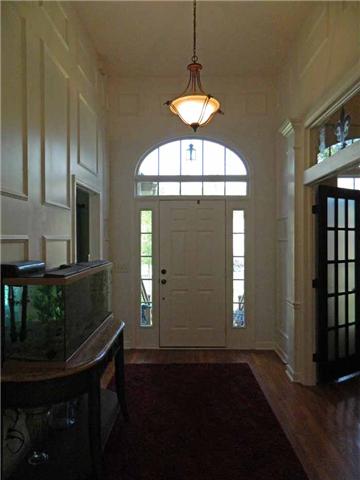 835 Ridgetop Drive Mount Juliet, TN 37122 - Photo 8 of 20 Grand Entry Foyer with hardwood flooring, floor to ceiling wainscoting