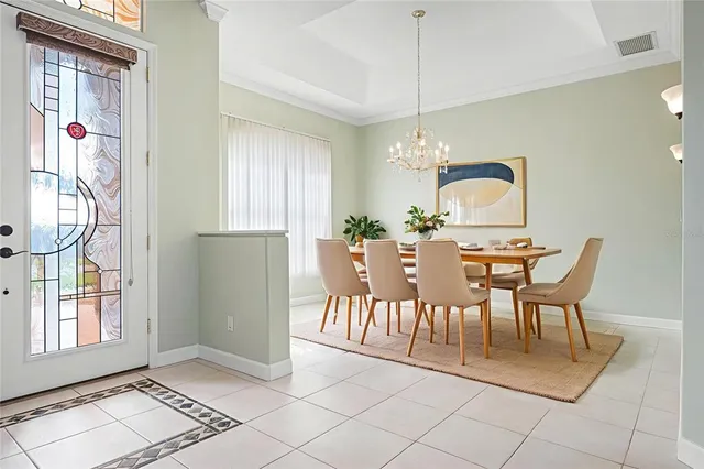 a kitchen with stainless steel appliances granite countertop a stove sink and cabinets