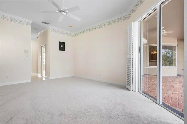 a kitchen with stainless steel appliances a sink window and cabinets