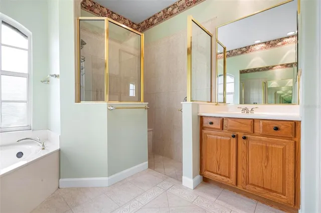 a living room with furniture a dining table and chairs