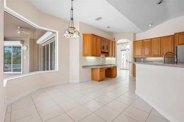 a bathroom with a double vanity sink a toilet and a mirror
