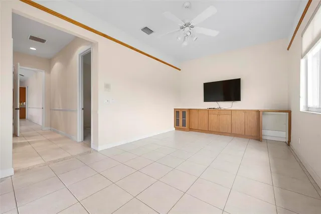 a view of a swimming pool with a yard