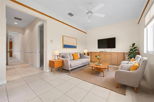 a backyard of a house with yard and outdoor seating