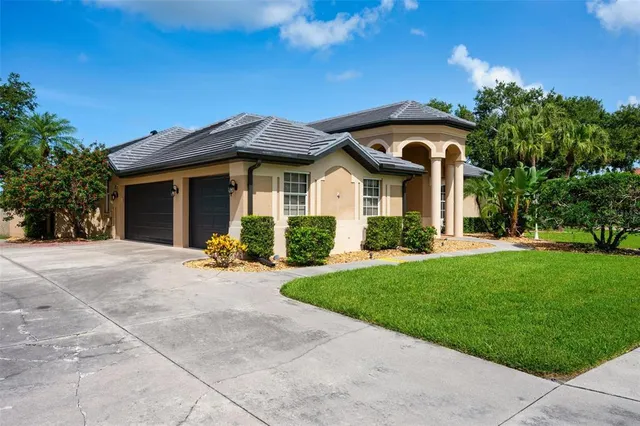 a view of a room with wooden floor and windows