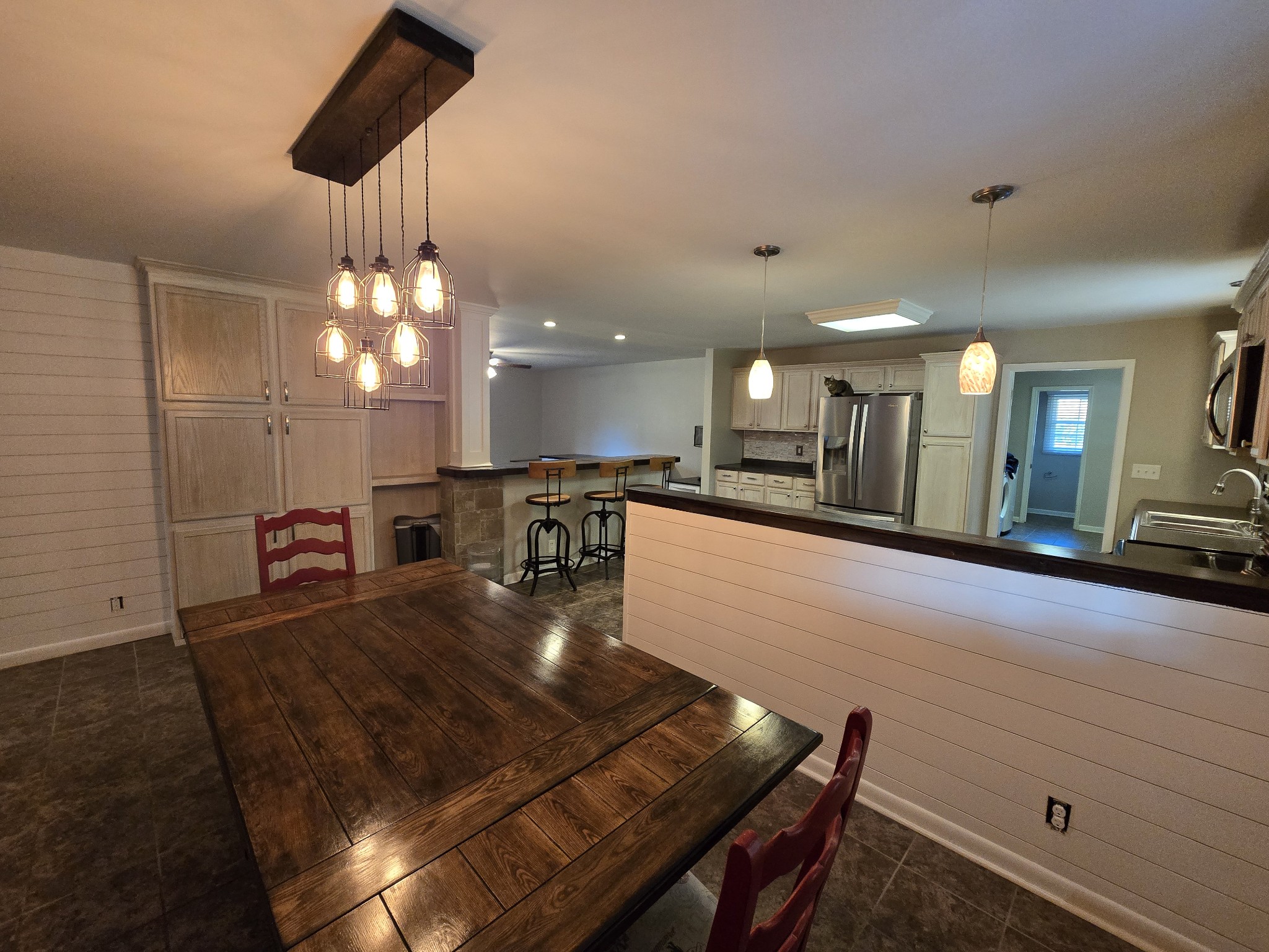 10831 Old Tullahoma Road Tullahoma, TN 37388 - Photo 9 of 25 a large kitchen with a table and chairs