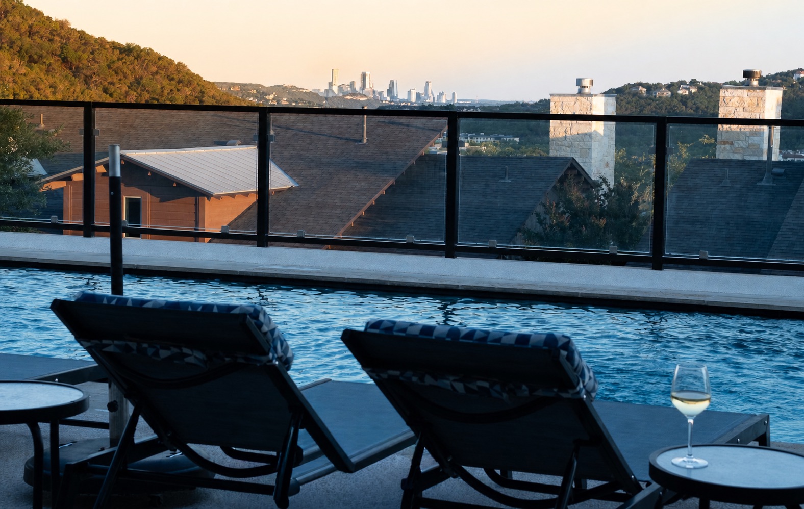 8110 Ranch Road 2222, Unit 10 Austin, TX 78730 - Photo 21 of 23 a balcony with table and chairs