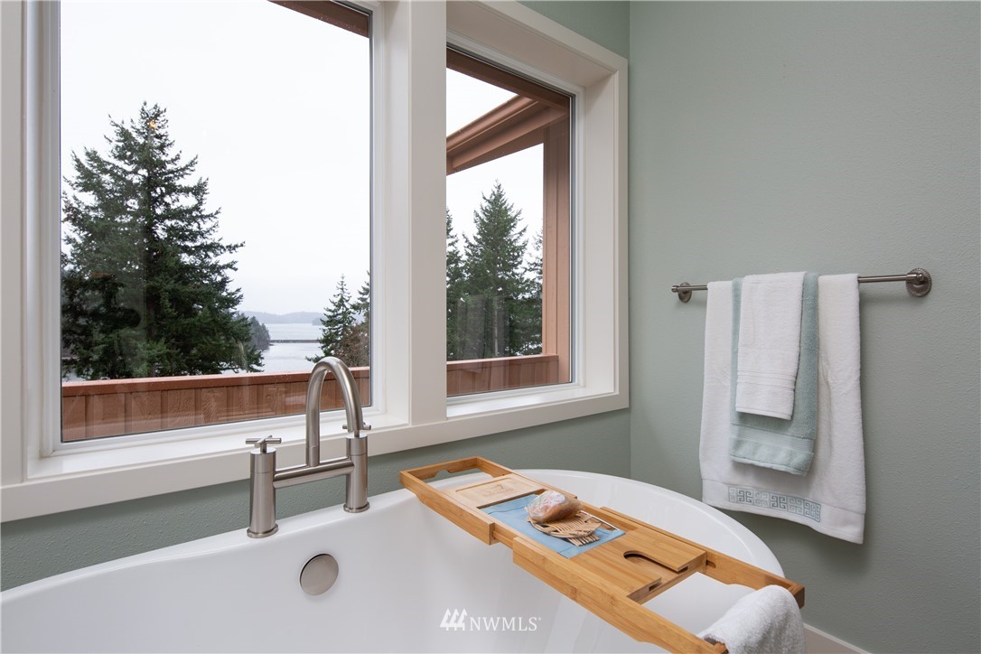 220 Sea Pines Road Bellingham, WA 98229 - Photo 18 of 40 a bedroom with a bed and a window with outer view