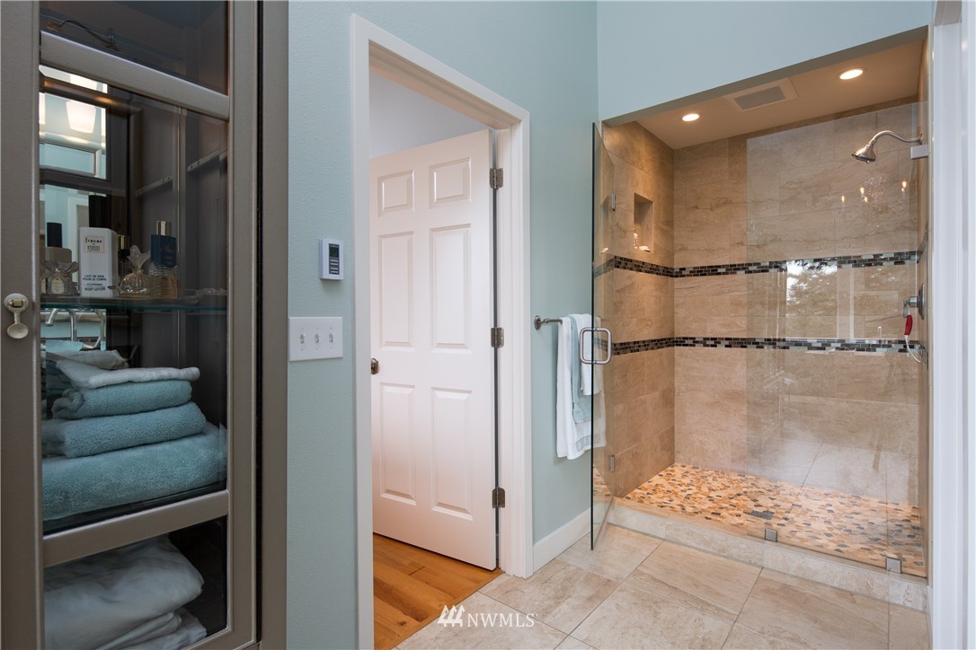 220 Sea Pines Road Bellingham, WA 98229 - Photo 19 of 40 a bathroom with a shower and a sink