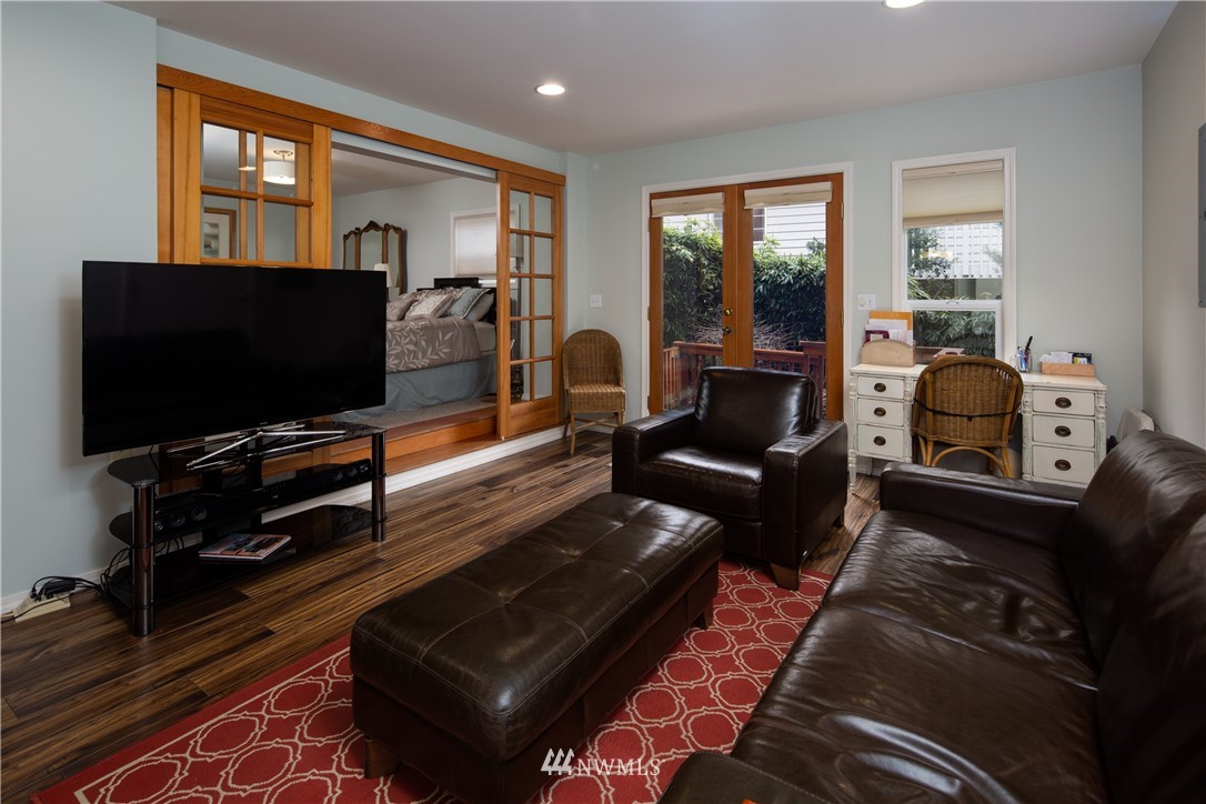 220 Sea Pines Road Bellingham, WA 98229 - Photo 24 of 40 a living room with furniture and a flat screen tv
