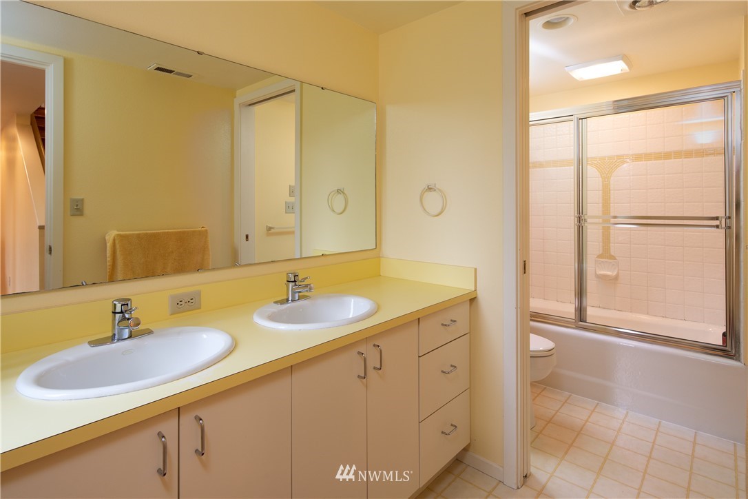 220 Sea Pines Road Bellingham, WA 98229 - Photo 29 of 40 a bathroom with a sink and a mirror
