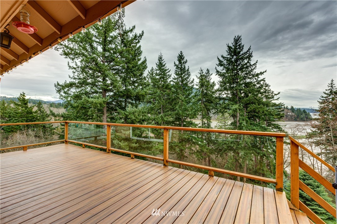 220 Sea Pines Road Bellingham, WA 98229 - Photo 33 of 40 a view of balcony with wooden floor and fence