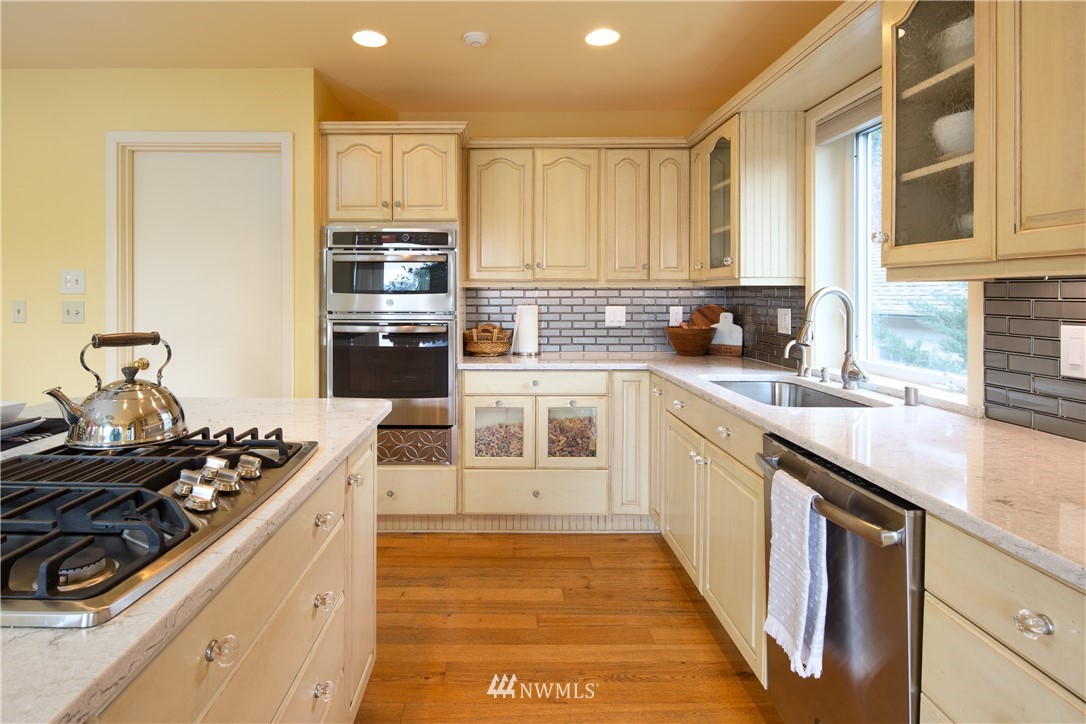 220 Sea Pines Road Bellingham, WA 98229 - Photo 9 of 40 a kitchen with stainless steel appliances granite countertop a stove and a sink