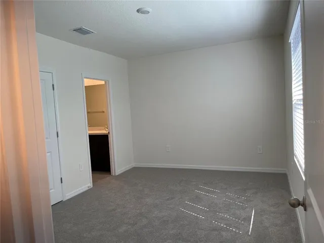 an empty room with closet