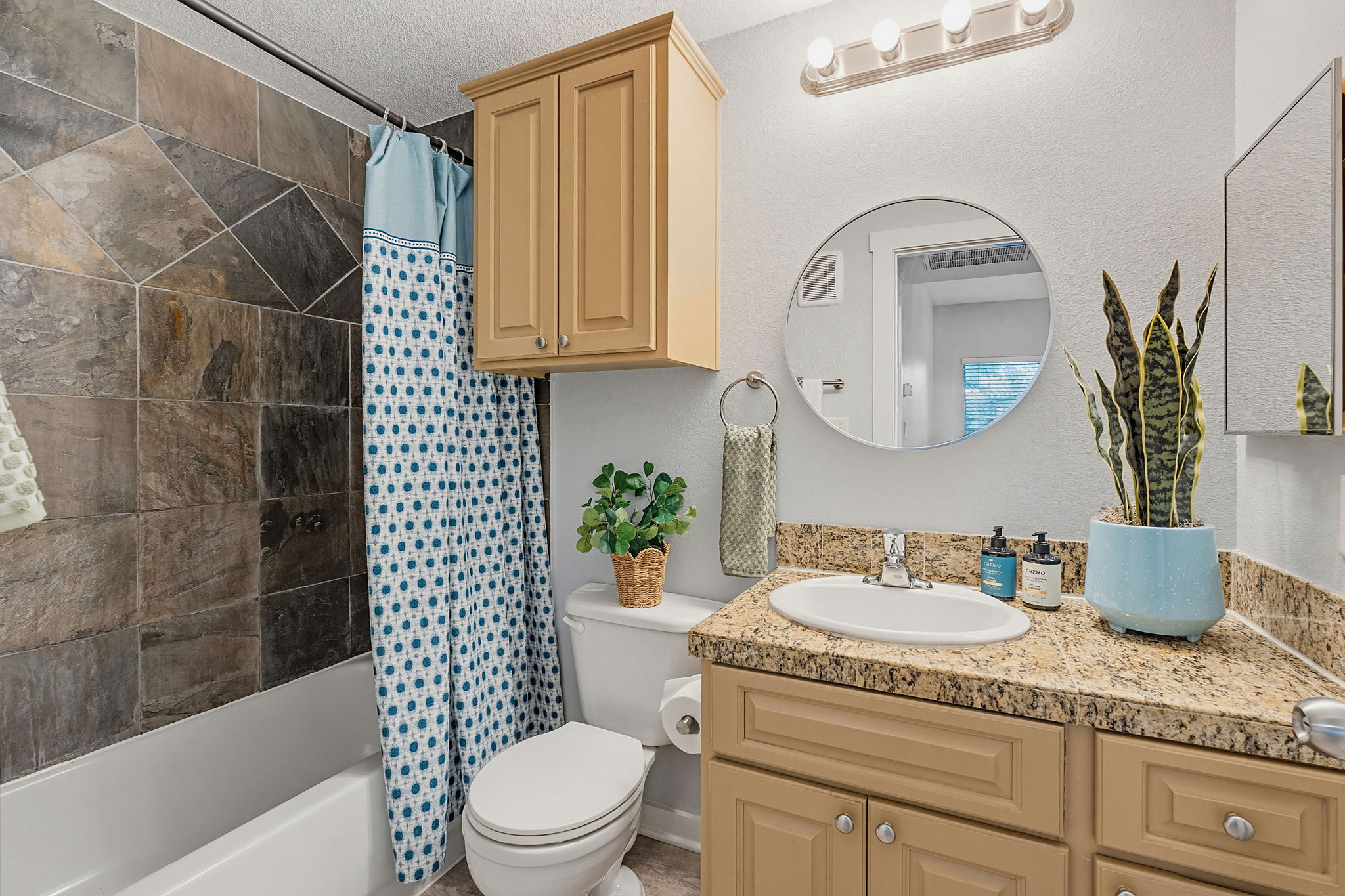 2106 Cullen Avenue, Unit 206 Austin, TX 78757 - Photo 15 of 20 Bathroom featuring a vanity with a granite countertop