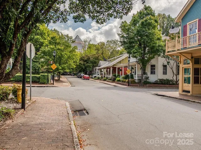 a view of street with houses