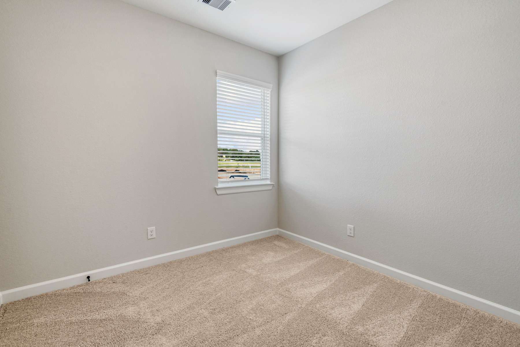 15765 Bayberry Trce Drive Conroe, TX 77303 - Photo 13 of 21 an empty room with a window