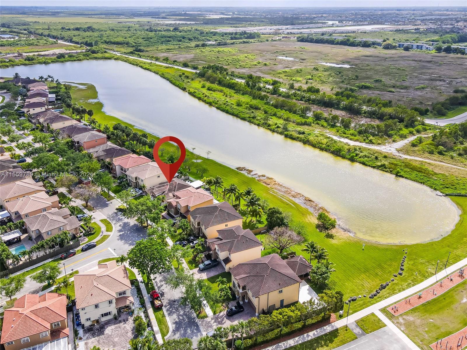 22438 Southwest 94th Path Cutler Bay, FL 33190 - Photo 31 of 38 a view of a city and an ocean view