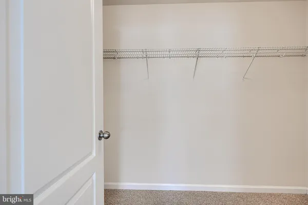 an empty room with a bathroom