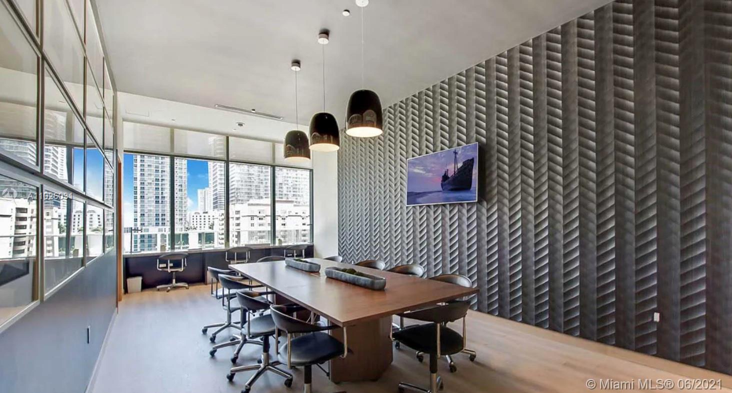 45 Southwest 9th Street, Unit 3102 Miami, FL 33130 - Photo 17 of 19 a workspace with furniture and window