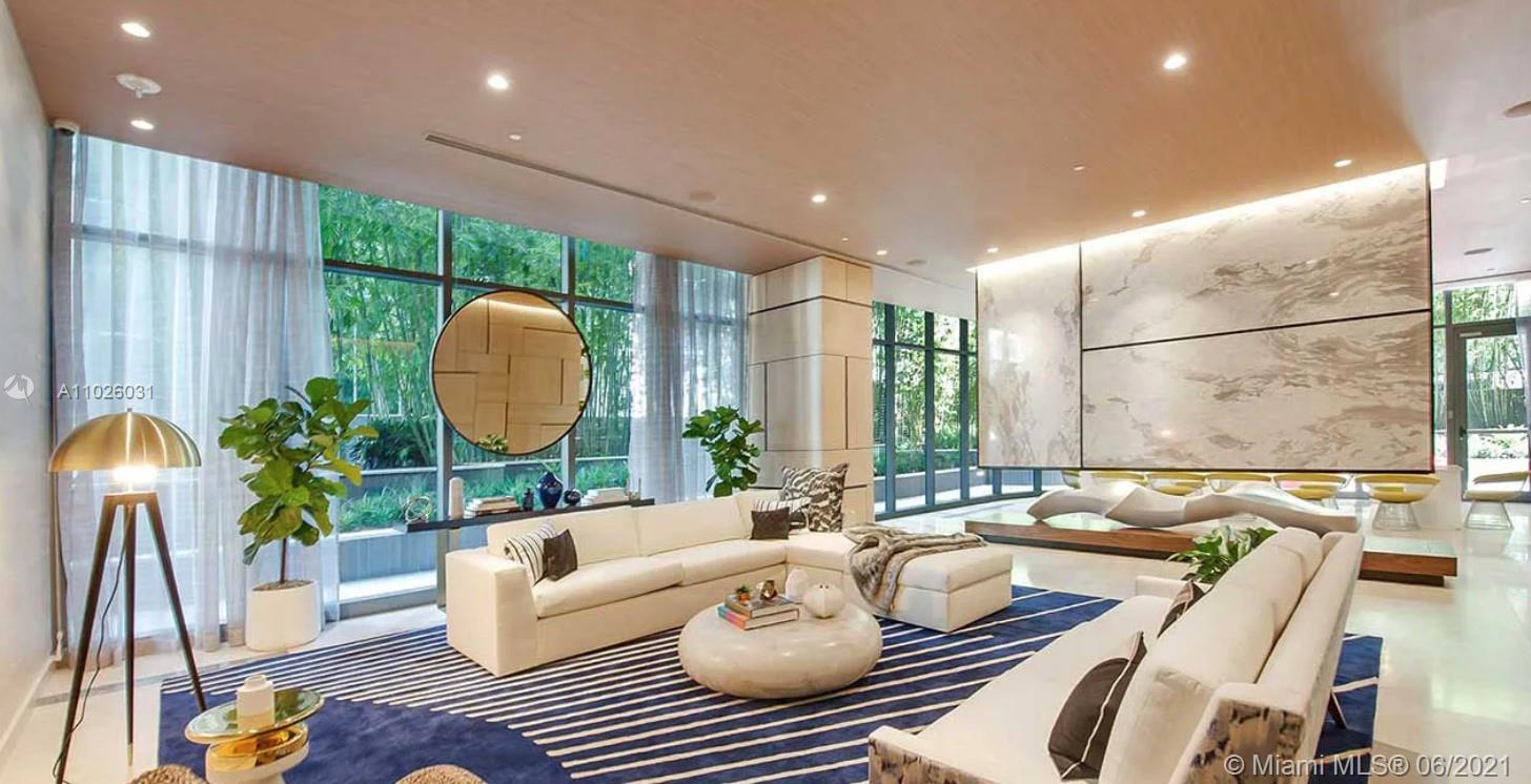 45 Southwest 9th Street, Unit 3102 Miami, FL 33130 - Photo 18 of 19 a living room with furniture and a large window