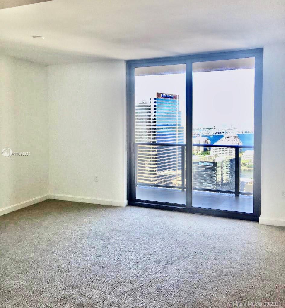 45 Southwest 9th Street, Unit 3102 Miami, FL 33130 - Photo 5 of 19 a view of a room with a large window