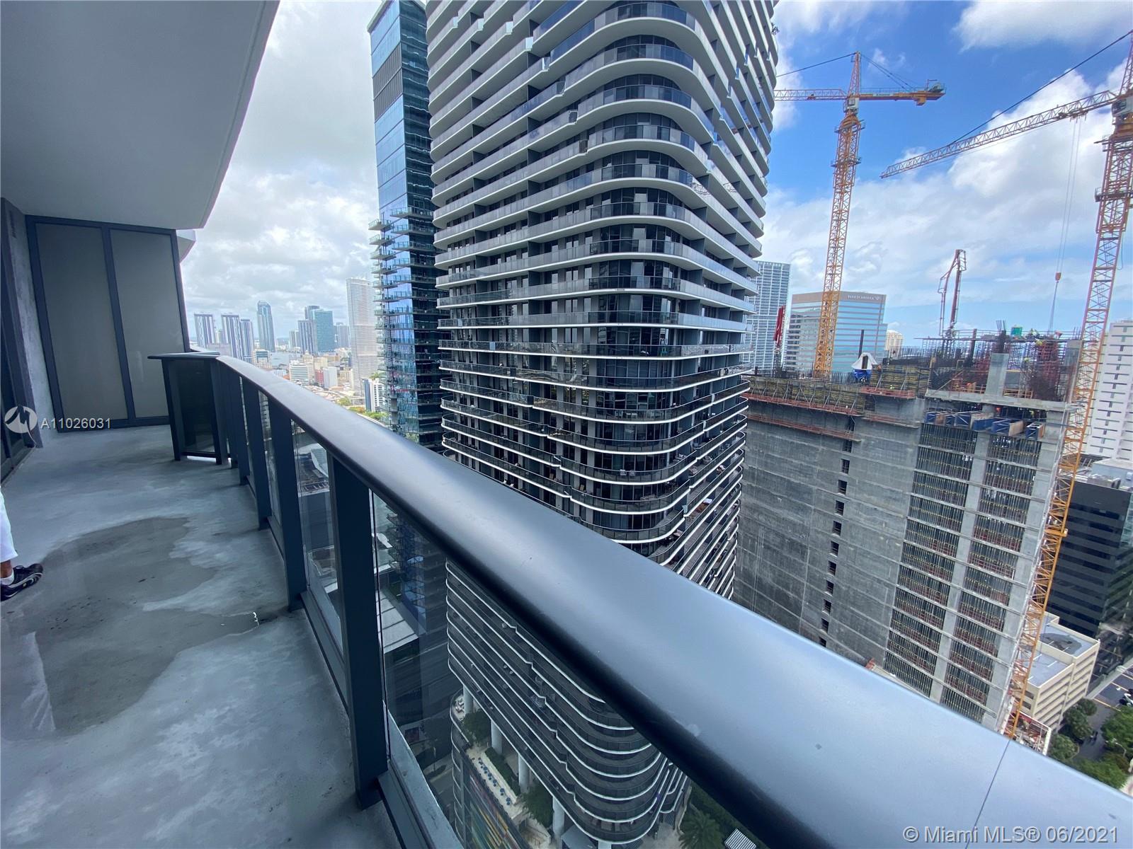 45 Southwest 9th Street, Unit 3102 Miami, FL 33130 - Photo 8 of 19 a balcony with a bench