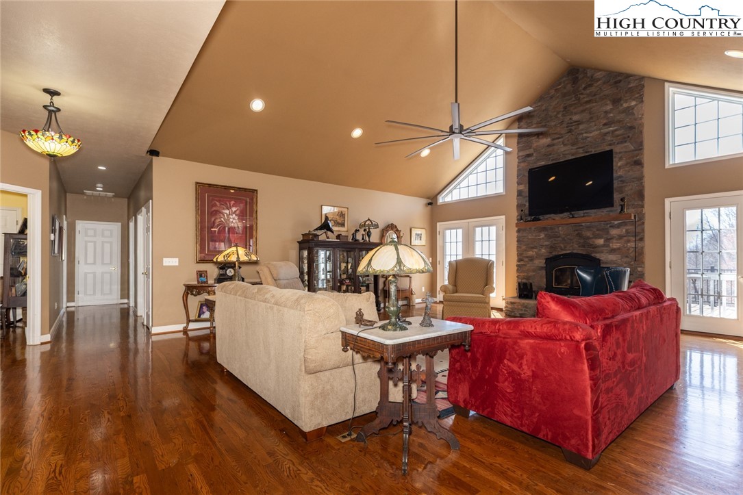 181 Abbey Road McGrady, NC 28649 - Photo 15 of 50 a living room with fireplace furniture and a wooden floor