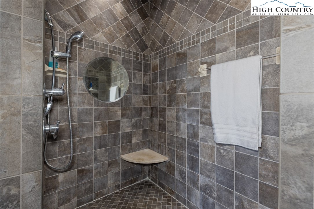 181 Abbey Road McGrady, NC 28649 - Photo 30 of 50 a bathroom with a shower