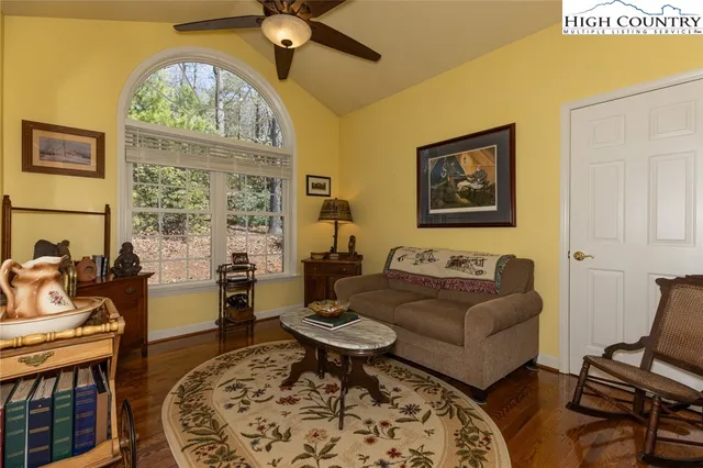 a bed room with a bed and a window