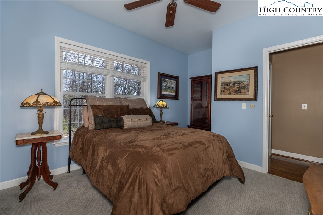 181 Abbey Road McGrady, NC 28649 - Photo 36 of 50 a bedroom with bed and window