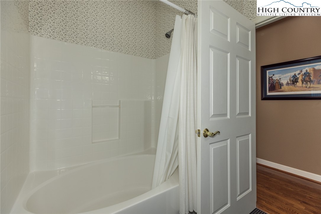 181 Abbey Road McGrady, NC 28649 - Photo 39 of 50 a bathroom with a bathtub