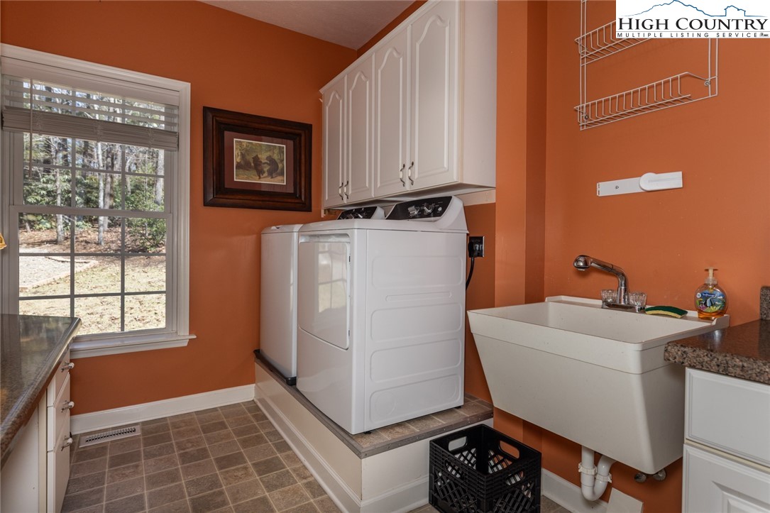 181 Abbey Road McGrady, NC 28649 - Photo 42 of 50 a utility room with dryer and washer
