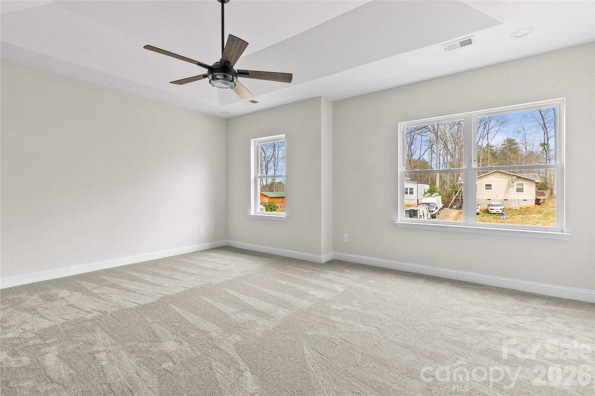 3692 Shannon Loop Denver, NC 28037 - Photo 24 of 47 an empty room with windows and fan