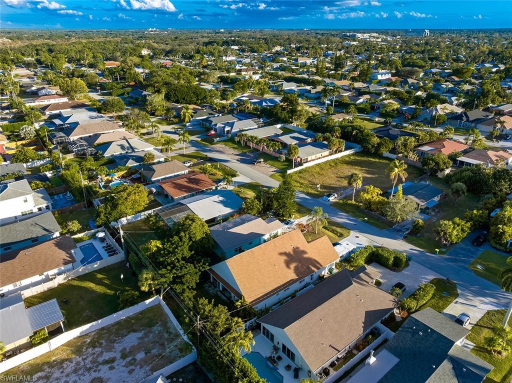 739 102nd Avenue North Naples, FL 34108 - Photo 7 of 20 an aerial view of residential houses with outdoor space