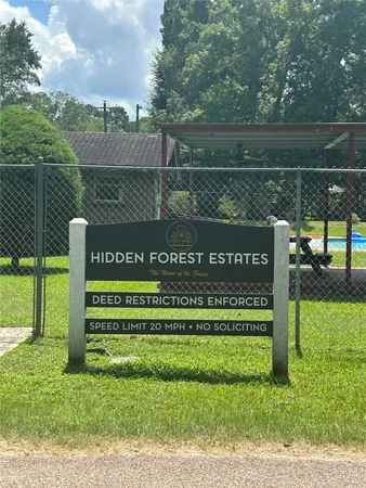 a view of a park that has sign board