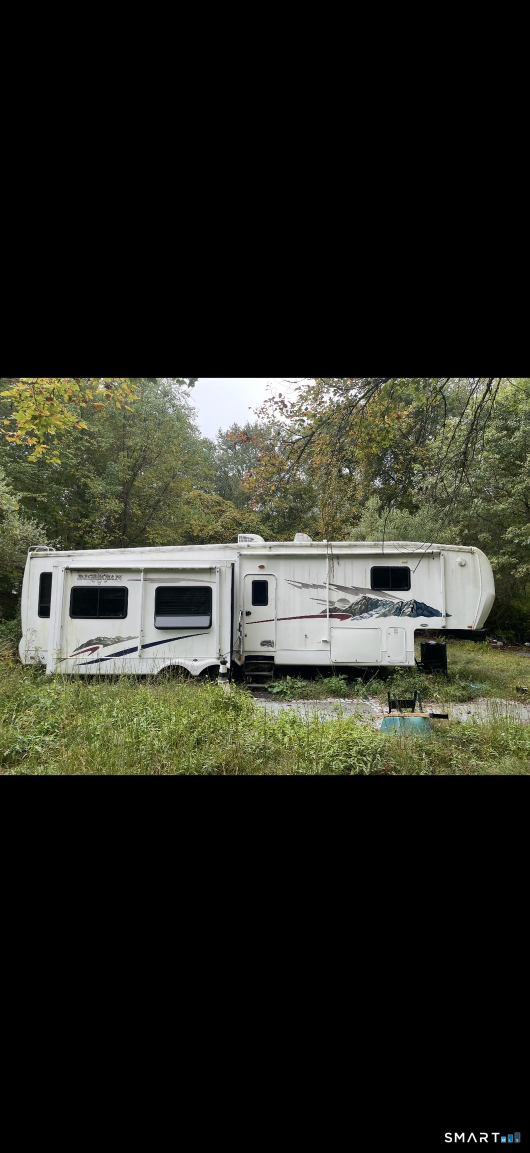 669 Shewville Road Ledyard, CT 06339 - Photo 2 of 2 Camper that is on the property that will stay with property