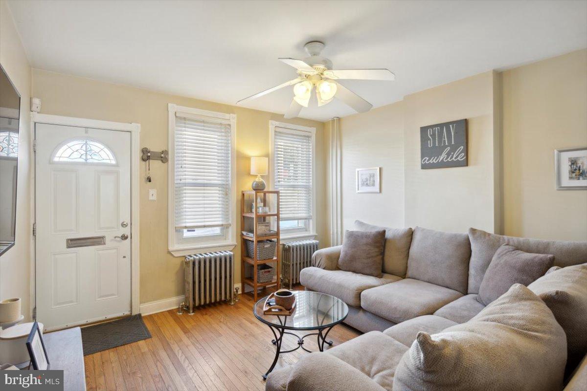 214 Ripka Street Philadelphia, PA 19127 - Photo 3 of 15 a living room with furniture and wooden floor