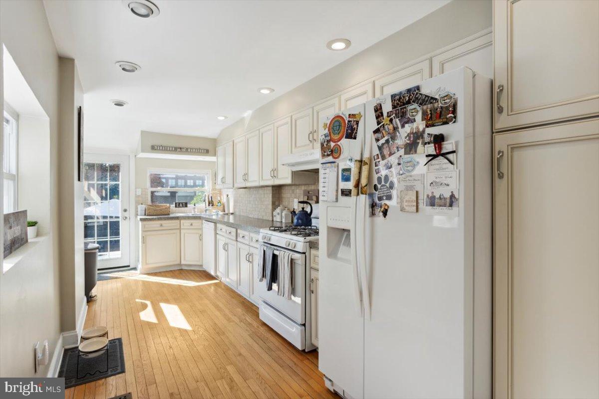 214 Ripka Street Philadelphia, PA 19127 - Photo 6 of 15 a kitchen with stainless steel appliances granite countertop a refrigerator and a sink