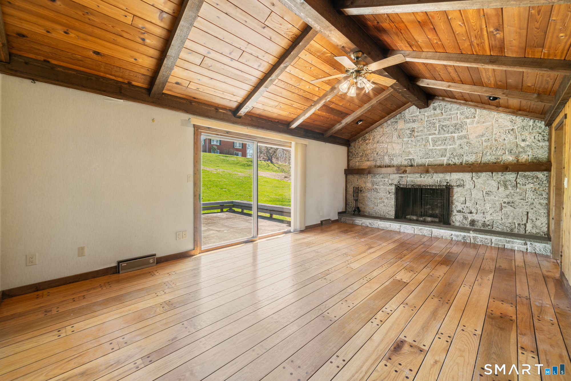 131 Sentinel Hill Road Derby, CT 06418 - Photo 1 of 40 a view of empty room with wooden floor and fireplace