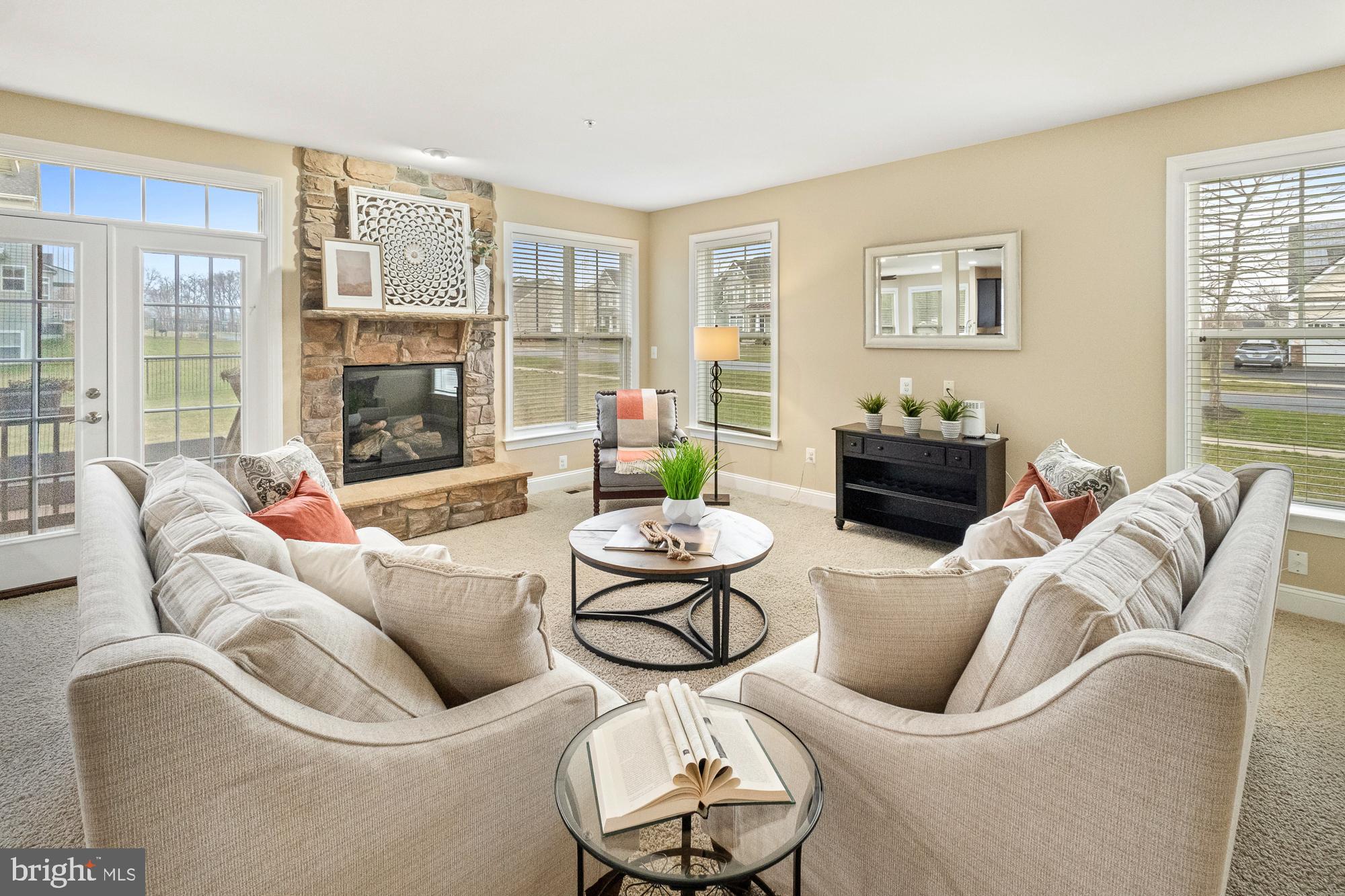17914 Dr Walling Road Poolesville, MD 20837 - Photo 27 of 86 Family room with stone front fireplace